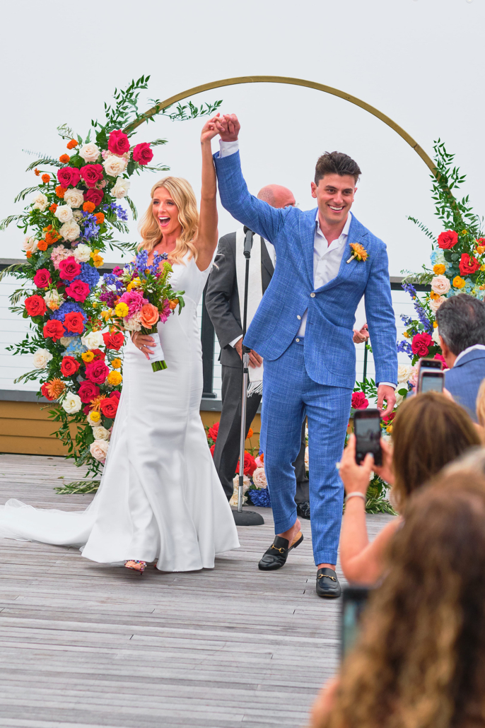 Dayna and Matt Wedding - Bride and Groom Bouquet Moon Gate Flower Arch - Gurney's Montauk - Andreas and Nico