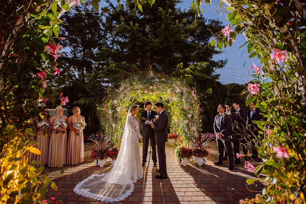 Alyson & Gary Wedding - Rose and Eucalyptus and Curly Willow Ceremony Floral Arch - The Estate at East Wind NY - Kate Neal Photography