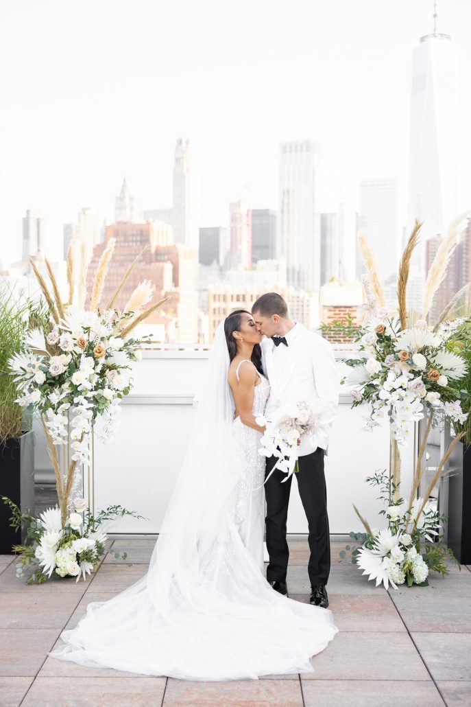 Joye and Scott Wedding - Bride and Groom Kissing Bouquet Altar Arrangements - Tribeca Rooftop - Rafal Ostrowski Photography