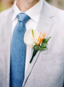 Anthurium Bird of Paradise Boutonniere - via weddingchicks.com