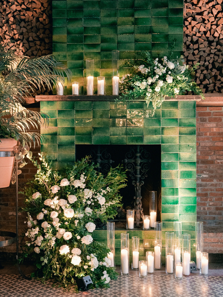 Alexis and Danny Wedding - Ceremony Backdrop Arrangement Candles - Bowery Hotel - Laura Watson Photography