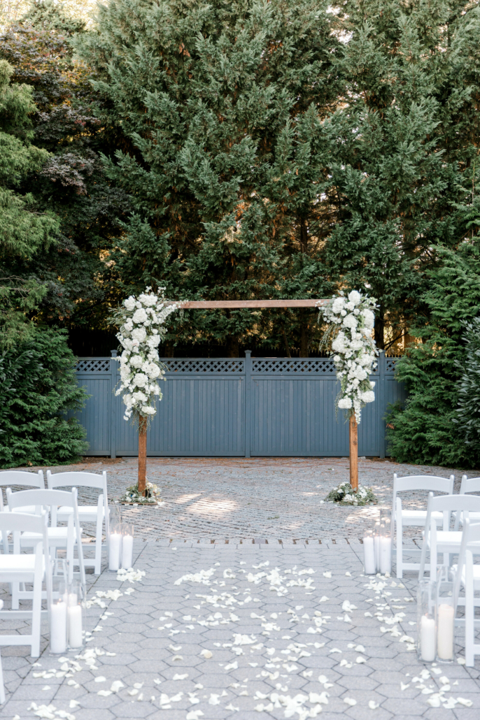 Jessica and Cody Wedding - Ceremony Atmosphere Floral Arch - New York Botanical Garden - Tanya Salazar Photography