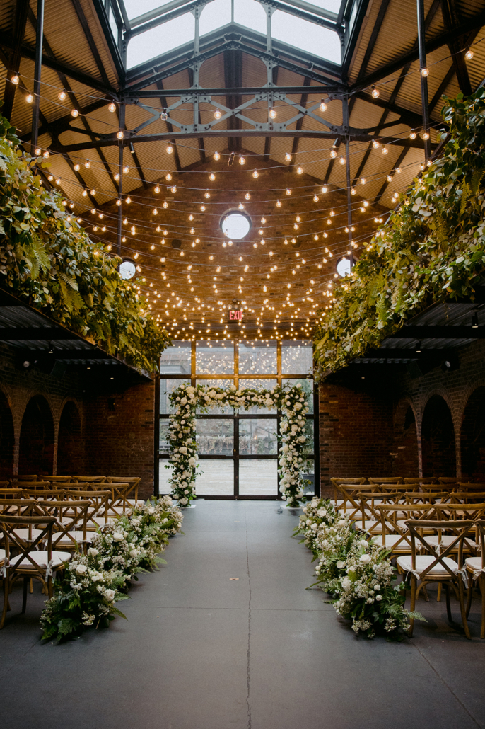 Julie and Nicholas Wedding - Ceremony Atmosphere Floral Arch Aisle Arrangements - The Foundry - Unique Lapin
