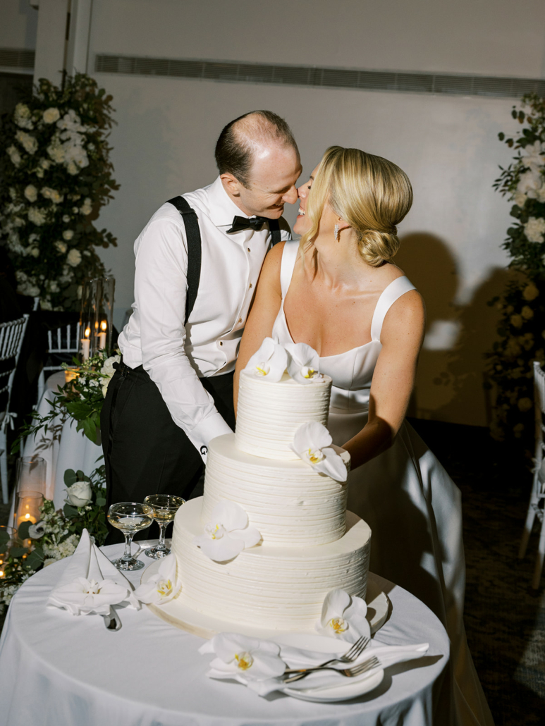 Christina and Mike Wedding - Bride and Groom Cutting the Cake - Brooklyn Botanic Garden - Sophie Kaye Garden