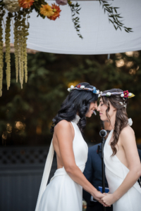 Katie and Alexa Wedding - Brides Embracing - New York Botanical Garden - Susan Stripling Photography