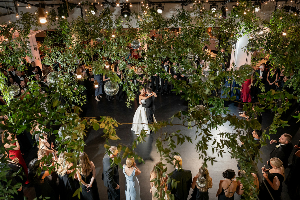 Victoria and Adam Wedding - First Dance - Greenery Disco Ball Installation - Tribeca Rooftop - Ein Photography