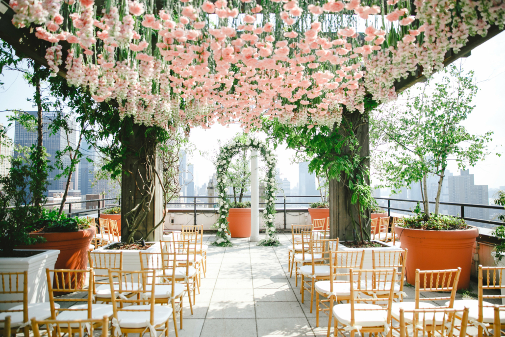 Mary and Galen Wedding - Hanging Pink Carnations Ceremony Arch - The Hudson Hotel - NYC Photography by Jac and Thom